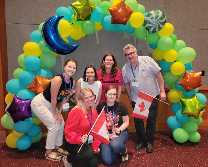 Project Search Team from SCE LIfeWorks posing under a balloon arch